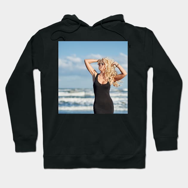 Sexy woman on the sea shore Hoodie by naturalis